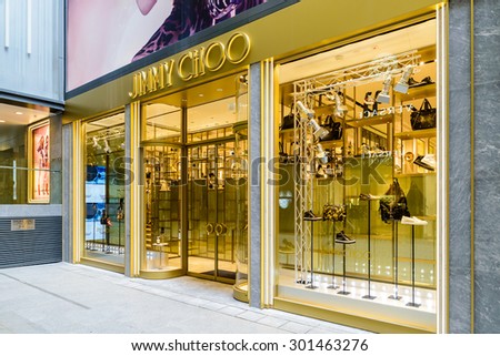 HONG KONG - JULY 28, 2015: Jimmy Choo store in Hong Kong. Jimmy Choo Ltd is a British fashion house, is known for its luxury shoes, designer bags, and accessories.