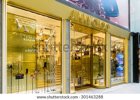 HONG KONG - JULY 28, 2015: Jimmy Choo store in Hong Kong. Jimmy Choo Ltd is a British fashion house, is known for its luxury shoes, designer bags, and accessories.