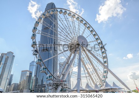 Hong Kong, China - July 29, 2015: Skyscrapers and Hong Kong Observation Wheel, which is the latest tourist attraction in the city.