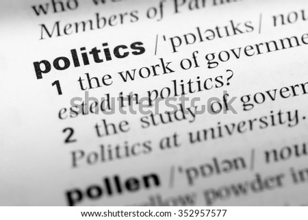 Close up of English dictionary page with word politics
