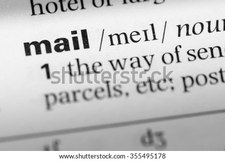Close up of English dictionary page with word mail