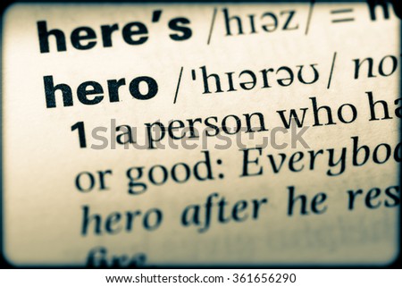 Close up of English dictionary page with word hero