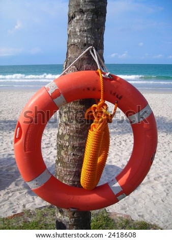 Closeup of life buoy at beach for life saving purposes