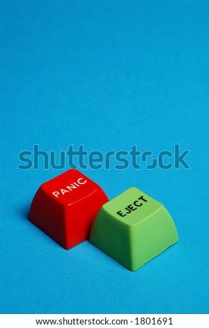 red panic button next to green ejection button