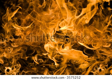 Campfire flames bright firey orange and yellow background