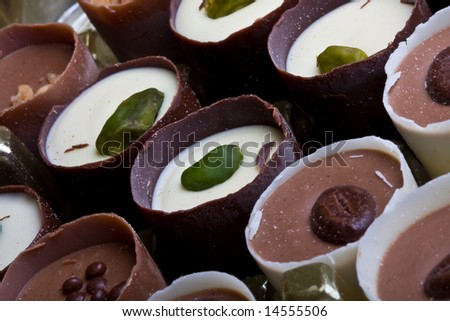 fancy box of chocolate candies white dark and milk