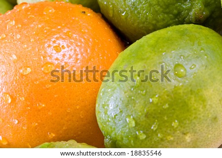 lemon lime orange fruit set close up and water drops in the set