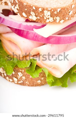 A healthy turkey sandwich on whole wheat bread