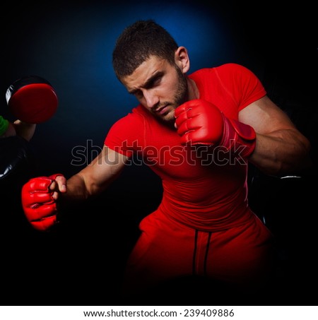 personal trainer man coach and man exercising boxing in the gym