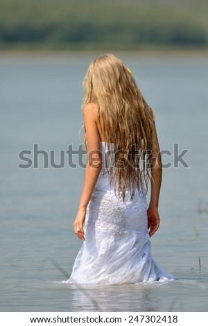 woman bride during photo session trash the dress