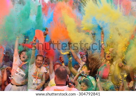 MAMAIA CONSTANTA ROMANIA AUGUST 1 Mamaia color run 2015 in Mamaia Constanta on August 1 2015 People from all walks of life participating in the fun colored summer run MAMAIA CONSTANTA ROMANIA AUGUST 1 Mamaia color run 2015 in Mamaia Constanta on August 1 2015 People from all walks of life participating in the fun colored summer run