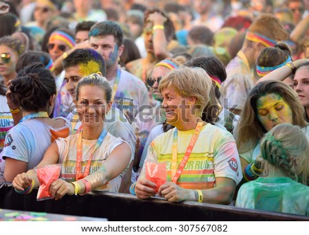 MAMAIA, CONSTANTA, ROMANIA - AUGUST 1, 2015: People participate in the Mamaia color run 2015 in Mamaia, Constanta.
