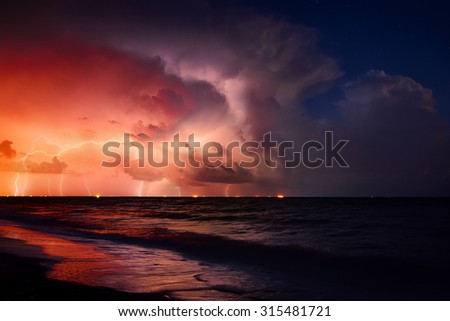 Nature force background - lightning in dark sky, sea