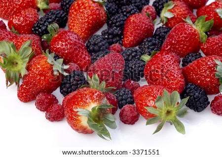 Summer fruit salad ingredients on white background