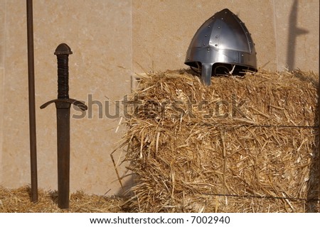 ancient metal helmet, sword and spear