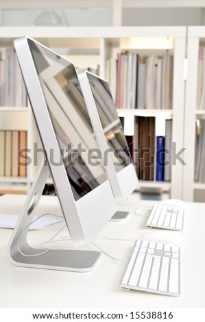 two computers in an office