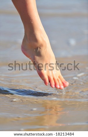 nice woman leg in the water