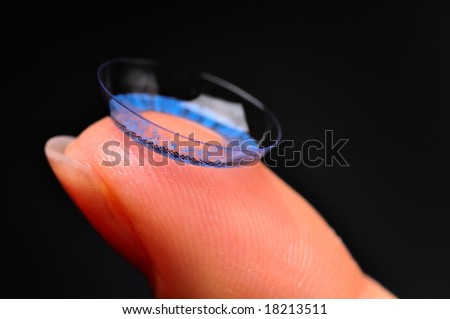 color contact lens on the finger