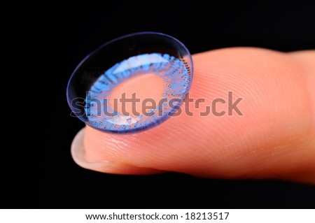 color contact lens on the finger