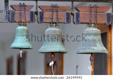 metal bell hanged up with rope