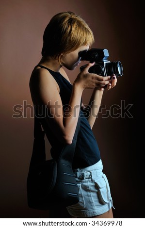 professional woman photographer in studio