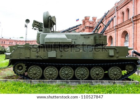 Vintage Russian military vehicle on green grass taken on a sunny day can be use for various background and military usage.