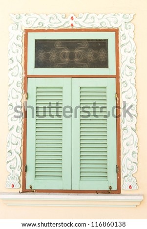Chinese temple window with chinese symbolic pattern on it