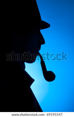 Silhouette of a private detective isolated on a blue background