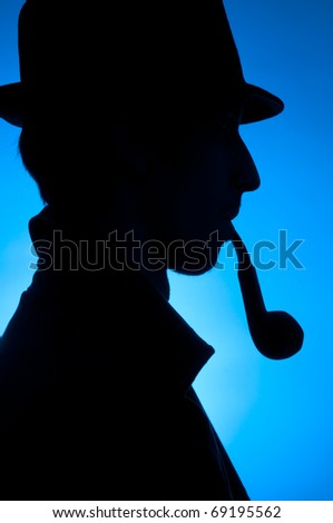 Silhouette of a private detective isolated on a blue background