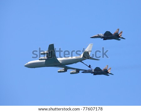 TEL AVIV, ISRAEL - MAY 10: An F-15 & Boeing 707 demonstrate an in flight refuel at the Tel Aviv Air Show dedicated to the Israel\'s 2011 Independence Day on May 10, 2011 in Tel Aviv, Israel.