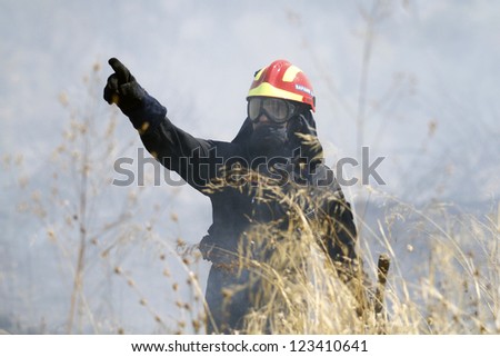 THESSALONIKI, GREECE - AUGUST 26: Fire department in action at a Seich Sou forest low scale fire on August 26,2011 in Thessaloniki, Greece.