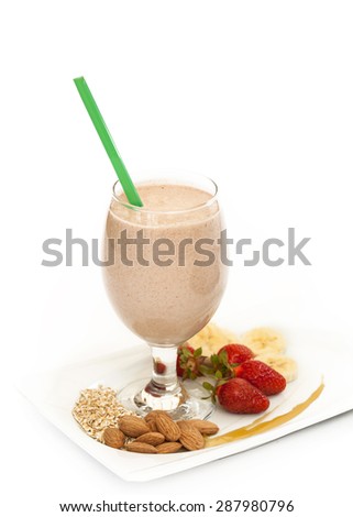 Smoothie with almonds, banana, maple syrup and strawberries