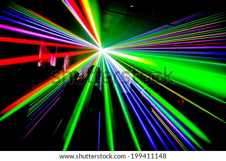 Multi coloured lasers in nightclub party