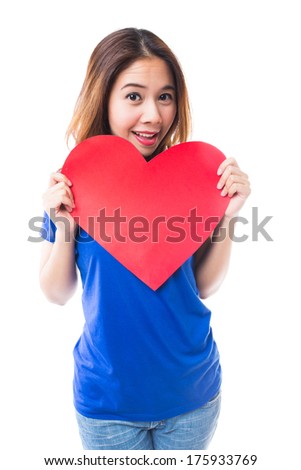 Young brunette woman holding red heart on white background, Love and valentines day concepts.