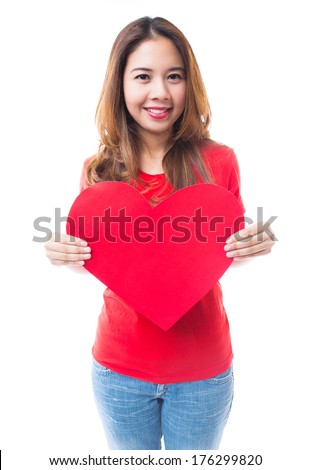 Young brunette woman holding red heart on white background, Love and valentines day concepts.