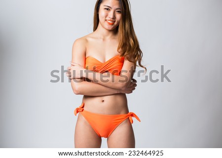 Young asian woman in bikini