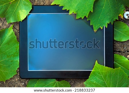 personal computer in the leaves on the ground