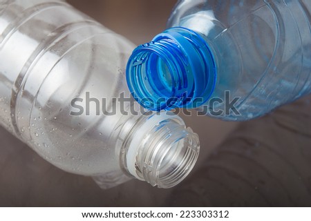 lying empty bottles for water