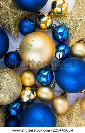 Christmas decorations blue and gold balls and gold stars