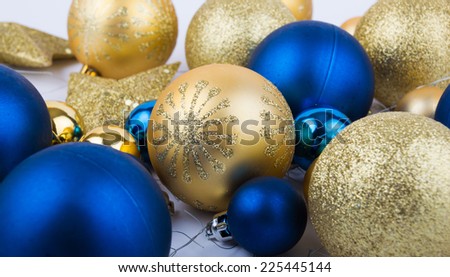 Christmas decorations blue and gold balls and gold stars