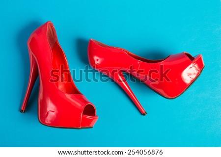 red shoes on a blue background