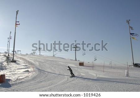 The skier on mountain at finish