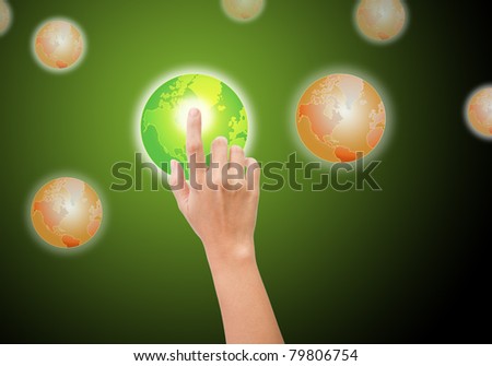 hand pushing the green world button