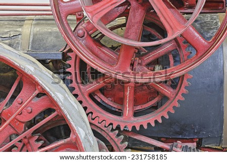 Closeup of Red Painted Gears on an Antique Steam Engine - Lambton County, Ontario, Canada