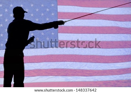 Silhouette of a Fisherman Holding a Fishing Pole fly fishing with a background of a USA American red white and blue flag.