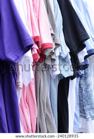 t-shirt hanging in cloth store for background and texture
