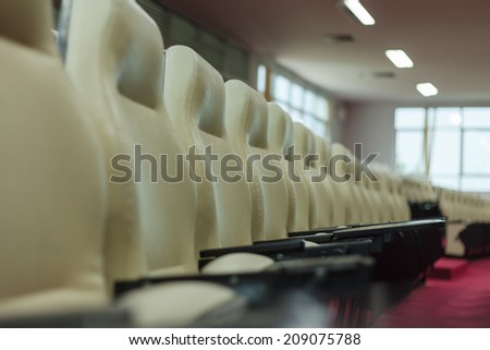 Row of chairs in conference room