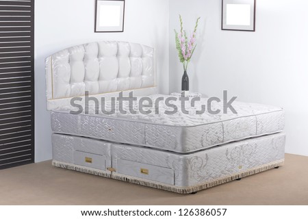 Luxury bedding mattress in a set up bedroom atmosphere
