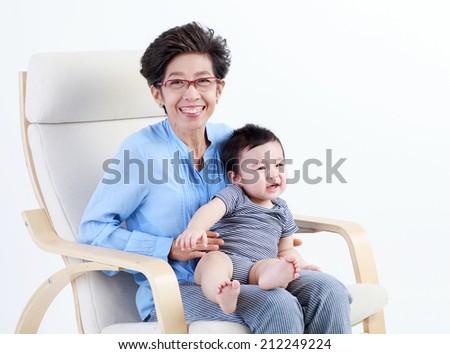 Grandma hugs crying grandson isolated