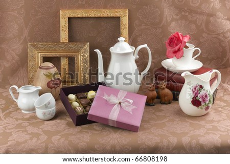 Beautiful chocolates gift box decorates by home decoration on brown background